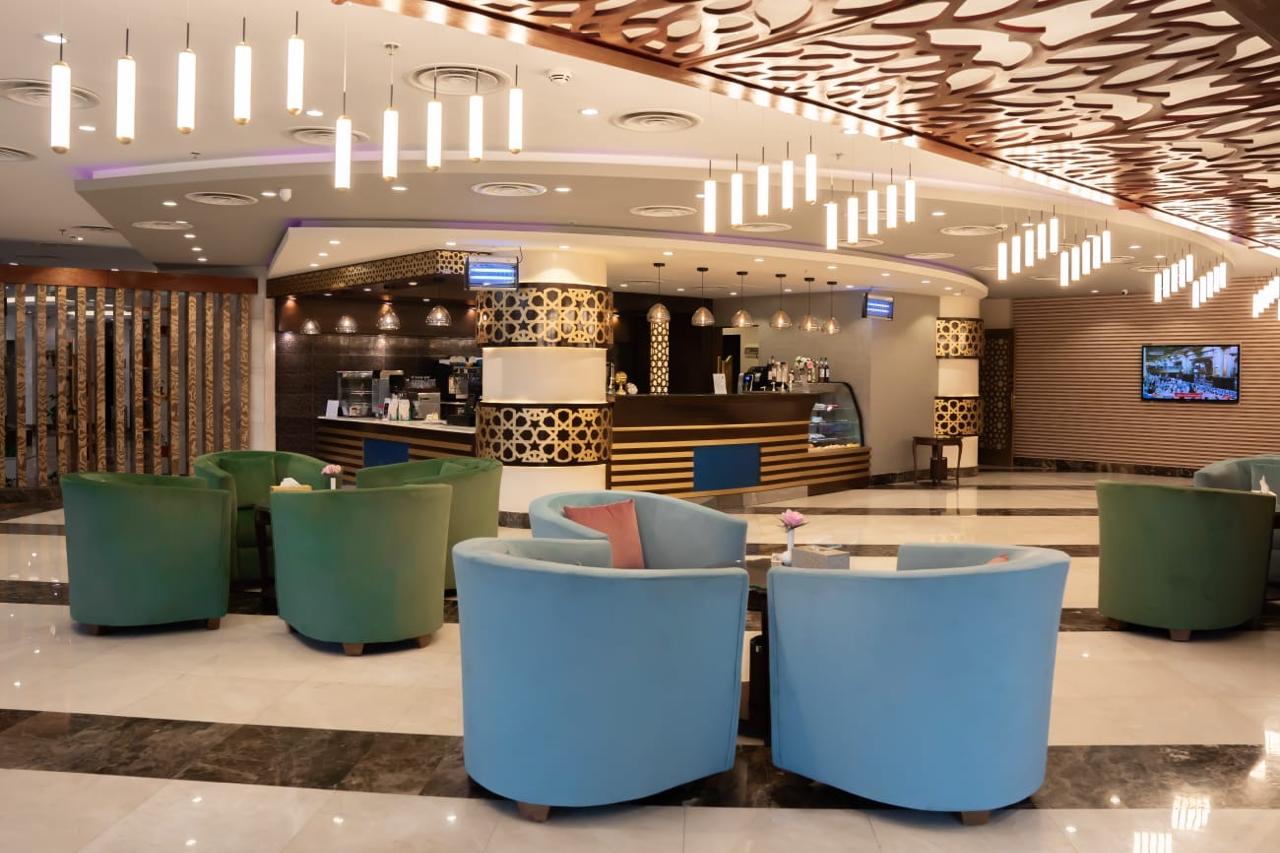 Alaa Al Bayt Hotel kafeterya alanı